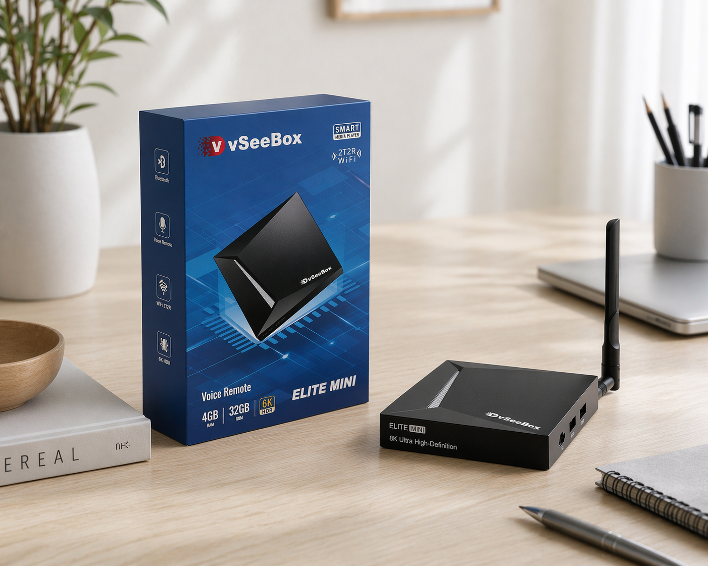 vSeeBox Elite Mini with packaging on a desk showing compact streaming device and box