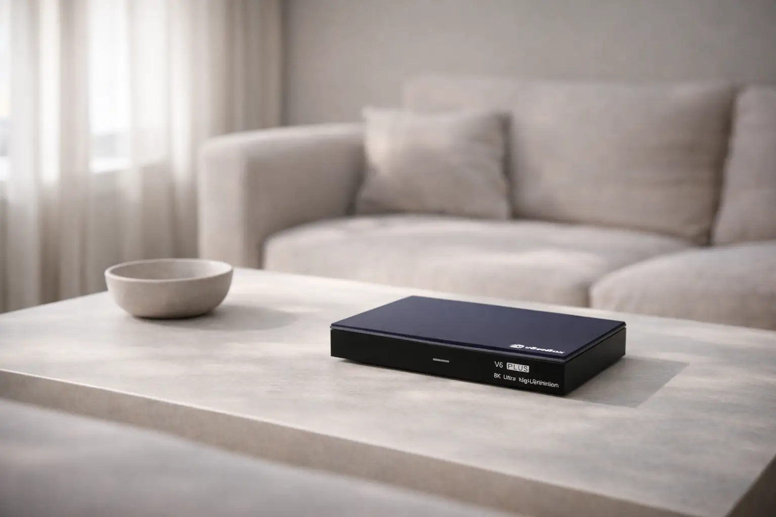vSeeBox V6 Plus streaming device on a modern living room table